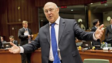 Den franske finansministern Michel Sapin har viss anledning till glädje. Arkivbild.