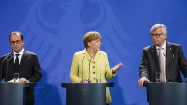 Frankrikes François Hollade, Tysklands Angela Merkel och EU-kommissionens Jean-Claude Juncker. 